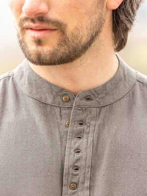 close_up_brown_grandfather_shirt_26e2990f-c6ce-4296-9357-5499d6f1aef9.jpg