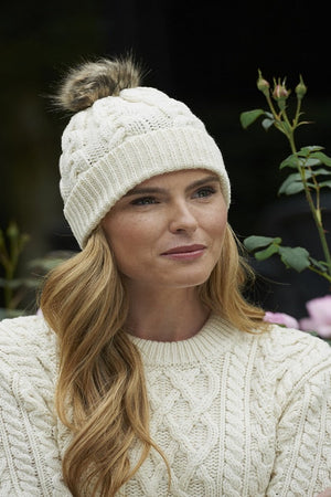 natural_pom_pom_hat_1_e378ecb8-7a69-4c3c-9a9c-95b019f579b4.jpg