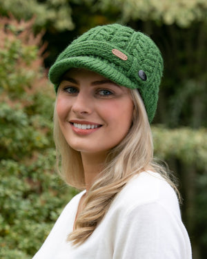 pk927-aran-cable-peak-hat-green-lifestyle-scaled_1_186f111b-952f-4fea-8498-5eb306d2ec66.jpg