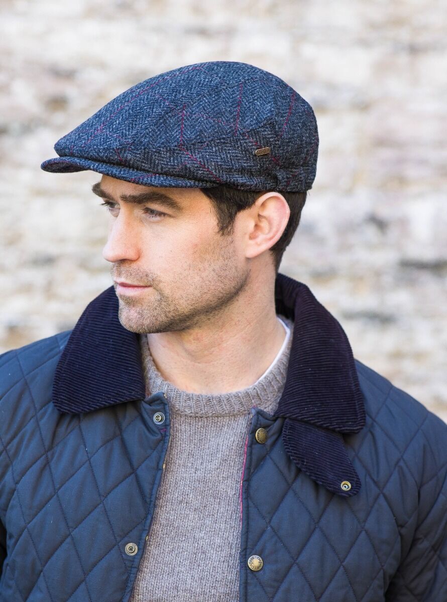 Flat cap with a peak online